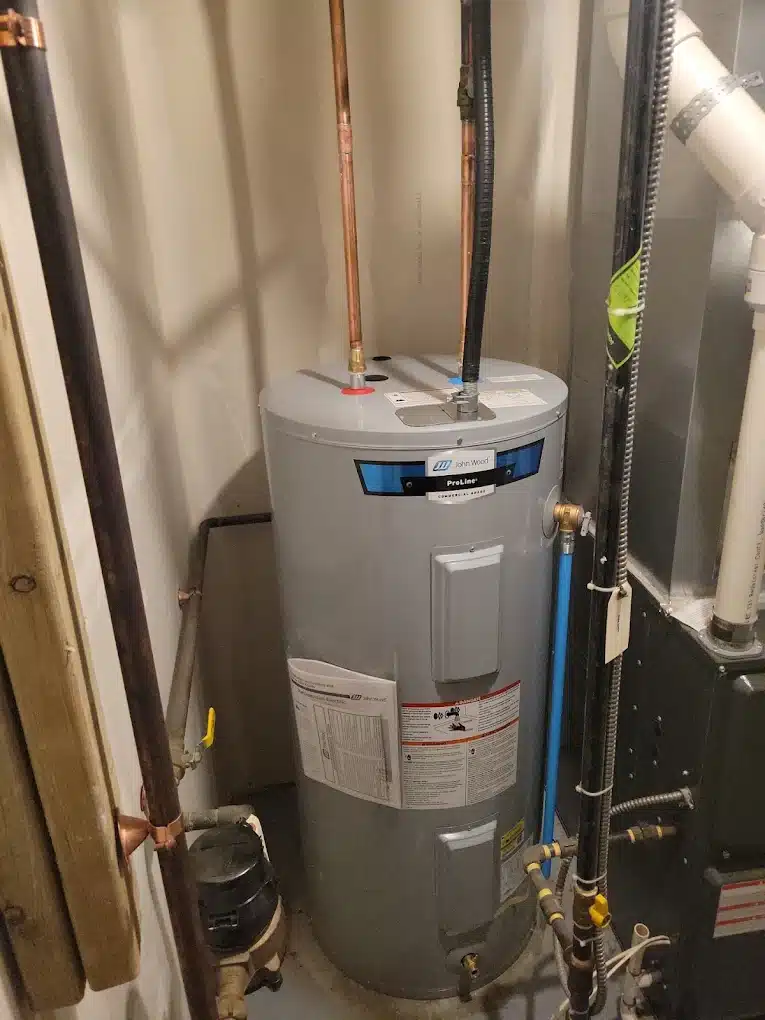 Residential water heater in utility closet